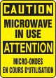 CAUTION MICROWAVE IN USE (BILINGUAL FRENCH)