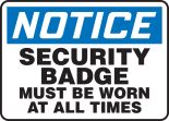 SECURITY BADGE MUST BE WORN AT ALL TIMES