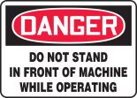 DO NOT STAND IN FRONT OF MACHINE WHILE OPERATING