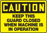 KEEP THIS GUARD CLOSED WHEN MACHINE IS IN OPERATION