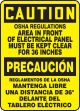 OSHA REGULATIONS AREA IN FRONT ELECTRICAL PANEL MUST BE KEPT CLEAR FOR 36 INCHES (BILINGUAL)