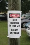 DANGER MEN WORKING ON THIS LINE DO NOT ENERGIZE
