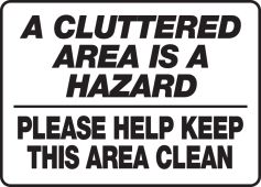 Safety Sign: A Clutter Area Is A Hazard - Please Help Keep This Area Clean