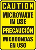 Bilingual OSHA Caution Safety Sign: Microwave In Use